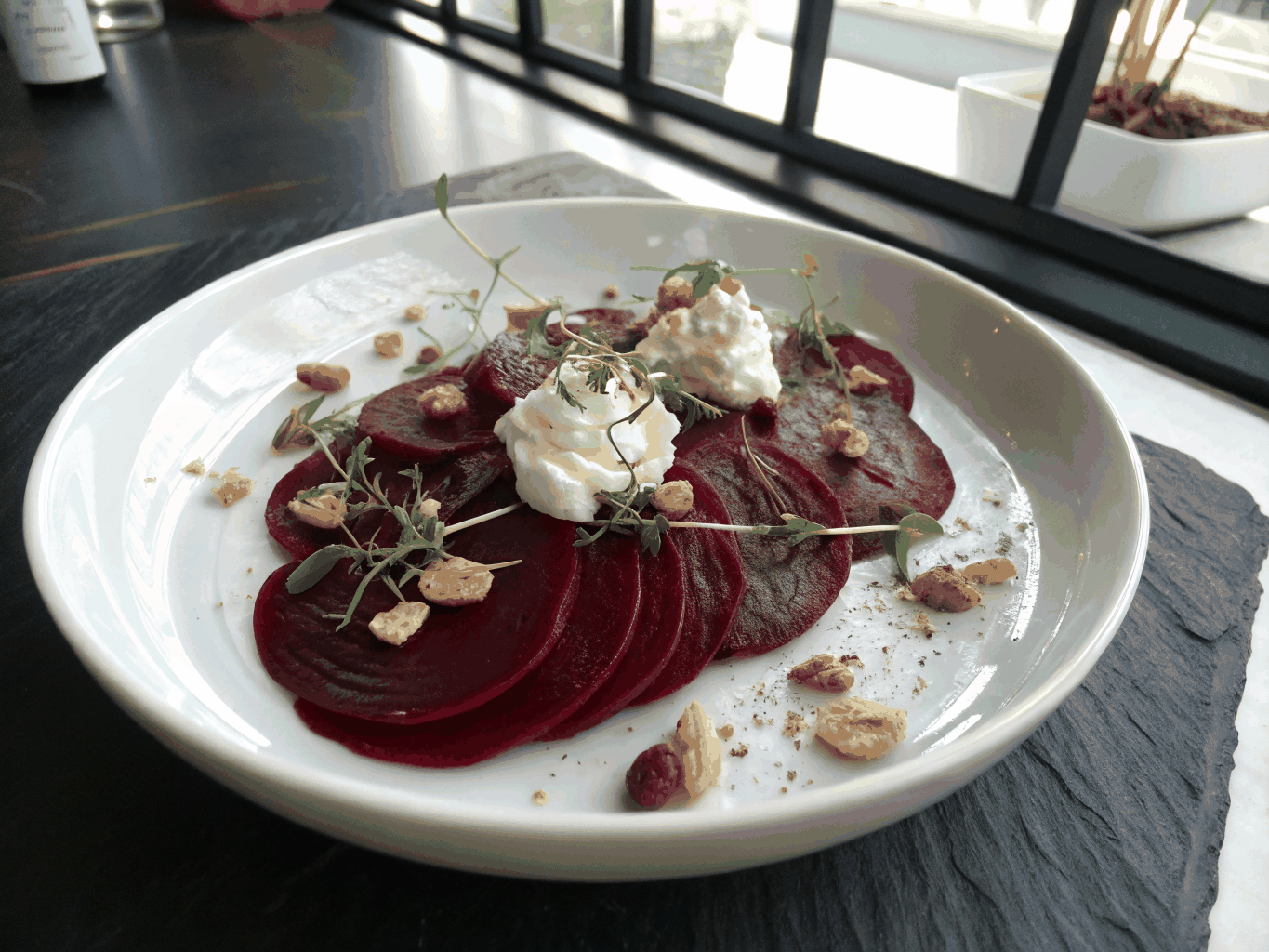 Roasted heirloom beets with whipped goat cheese and walnuts